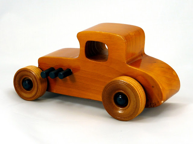 Left Rear - Wooden Toy Car - Hot Rod Freaky Ford - 27 T Coupe - Pine - Amber Shellac - Black Hubs