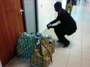 Recall process: INEC officials drop notice, Ghana-must-go bags outside Senator Dino Melaye?s office