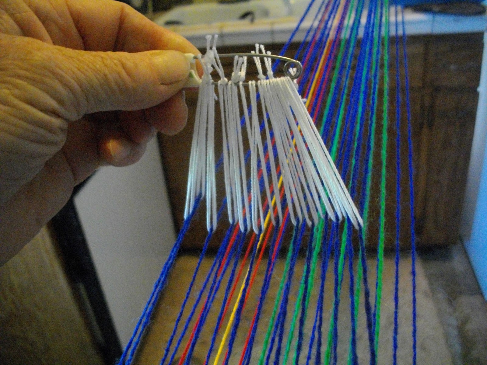 Reggie the Potter... and Tape Loom Weaver Adding an Extra Heddle to