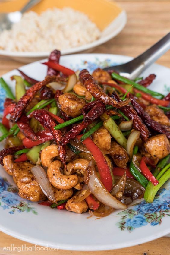 This is a Thai recipe from my friend Hanuman, featured in 49 Classic Thai Stir Fry Dishes recipe ebook. In this Thai cashew chicken recipe, you'll learn how to make a quick and easy version of this amazing dish.