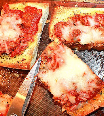 This is a picture of freshly cooked sliced french bread pizza
