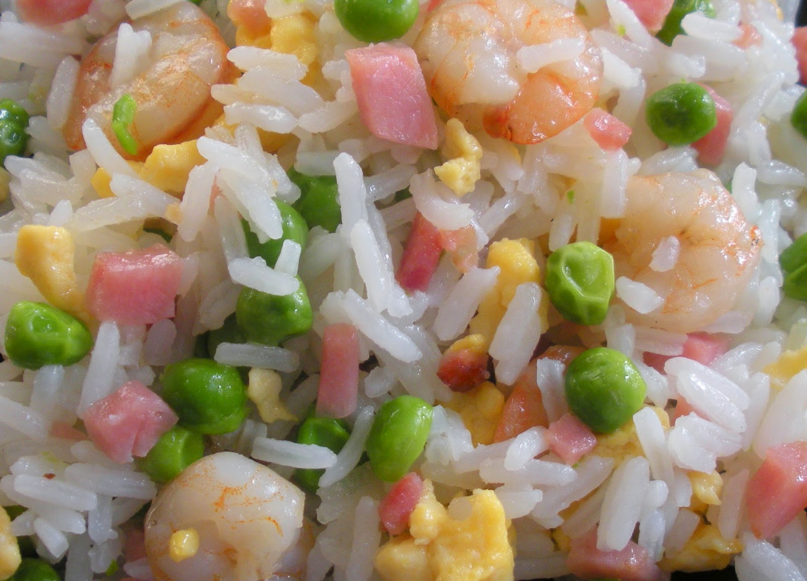 Aquí se cocina Arroz tres delicias Aquí se cocina Arroz tres delicias