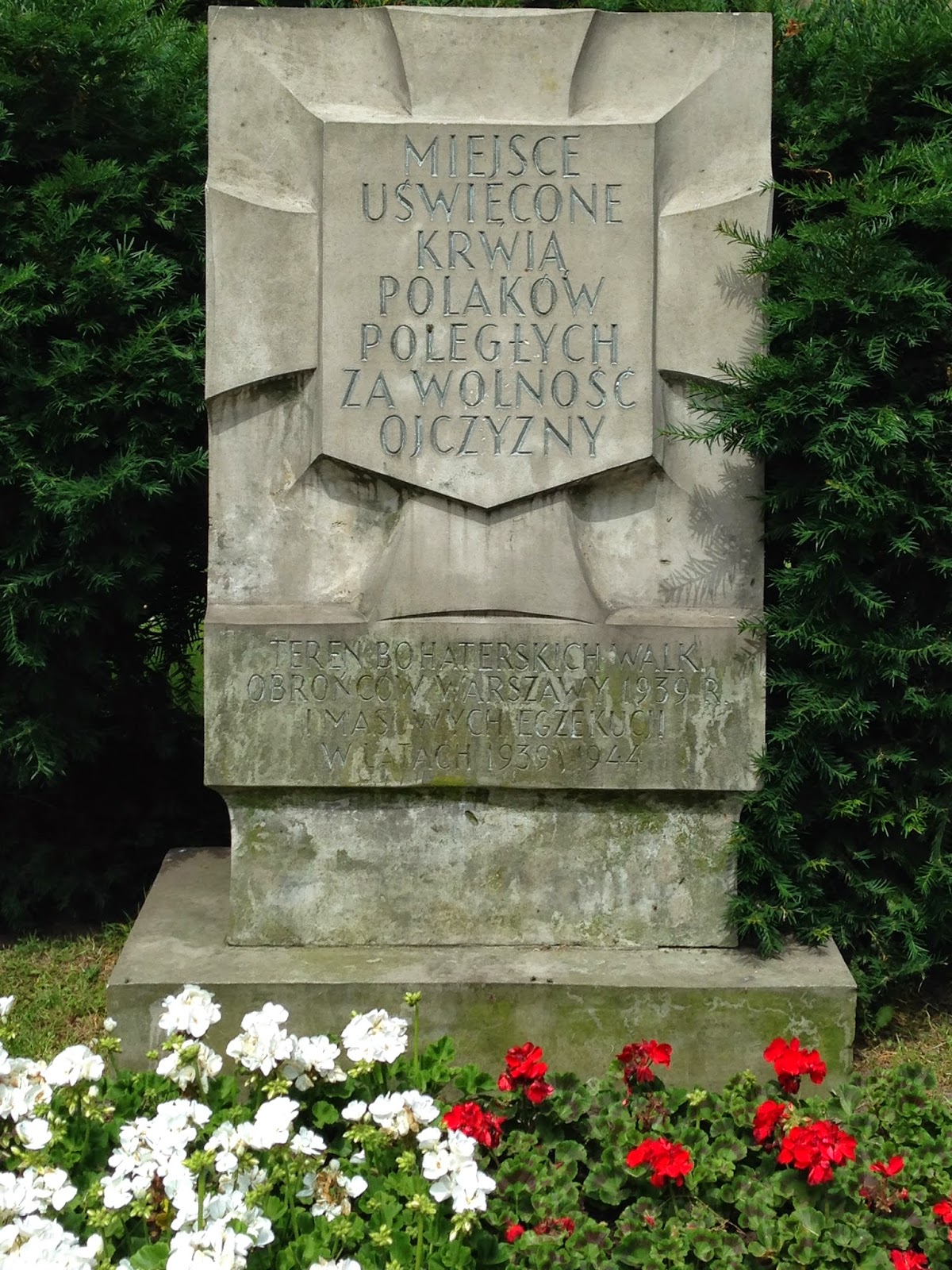 Historical marker of a Nazi massacre of civilian Poles, by Maja Trochimczyk