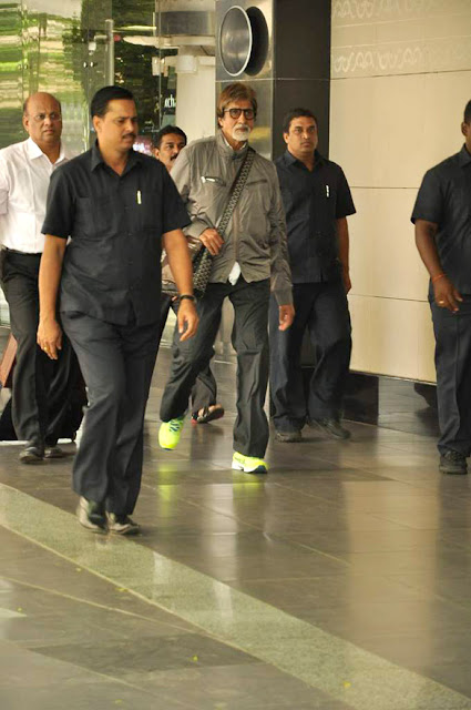 Amitabh Bachchan snapped in green florescent sports shoes 