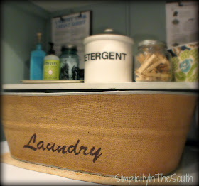 Fabric covered galvanized bins for storage. Laundry room reveal.