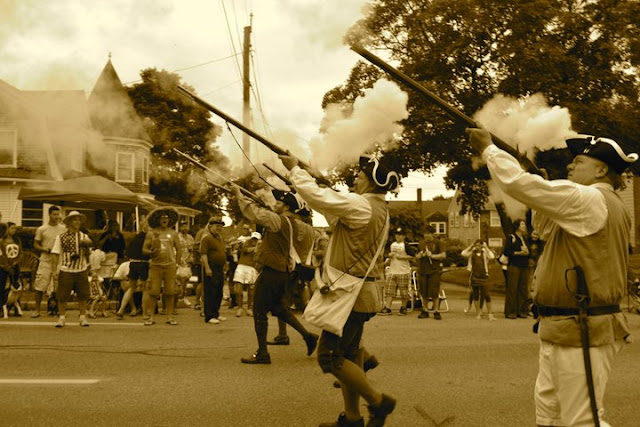 Guns Fire at the Parade