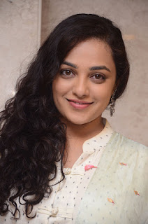 nitya menon at 100 days of love audio launch nitya menon at 100 days of love audio launch