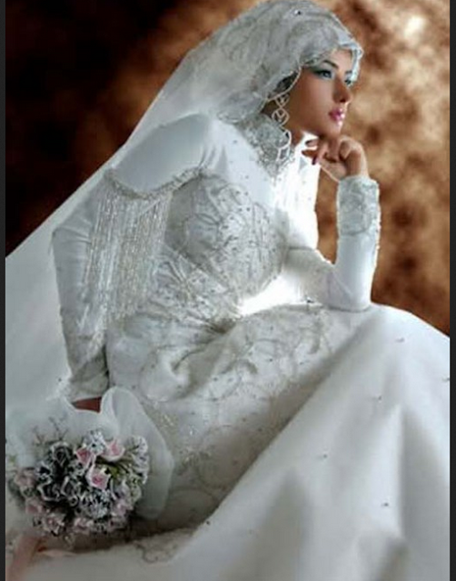 Gaun pengantin modern dengan aksen bordir Gaun pengantin modern dengan aksen bordir