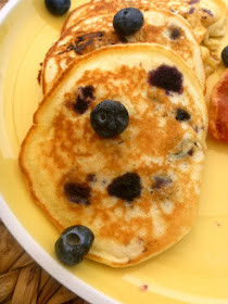 Fluffy, tender pancakes, bursting with hot blueberries and country flavor! A weekend breakfast staple.  Easy Country Blueberry Pancakes - Slice of Southern
