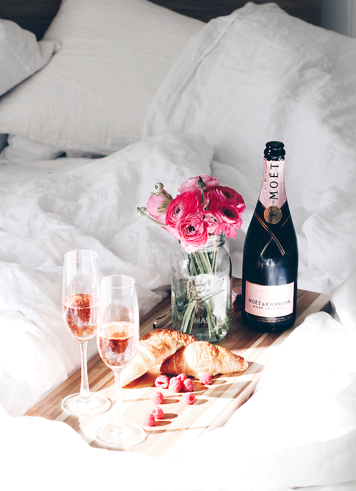 Breakfast in bed with pink champagne and ranunculus |  Mija