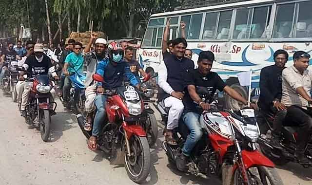 Motorcycle Pursuit of Pineapple Symbol of Independent Pursuit in Belkuchi বেলকুচিতে স্বতন্ত্রপ্রার্থী আনারস প্রতিকের মোটরসাইকেল শোভাযাত্রা