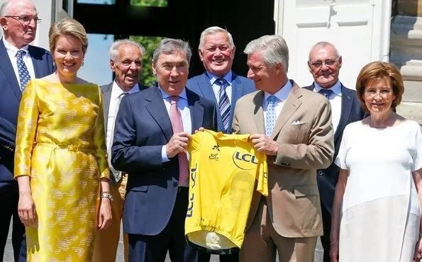 Queen Mathilde wore a yellow belted Natan dress. start of the 106th edition of Tour de France cycling race in France