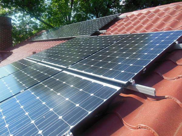 Nessy Designs: Metal Tile Roof with Solar Panels