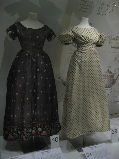 1820s fashions. The gown on the left is a purple silk gauze.