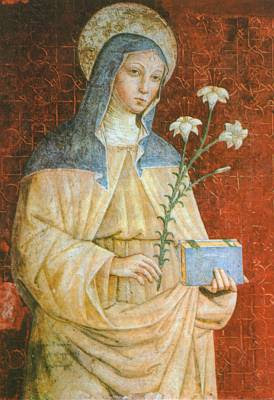 santa Clara con lirios y un libro en las manos