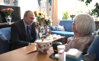 Vladimir Putin with Lyudmila Alexeyeva. Vladimir Putin with Lyudmila Alexeyeva.