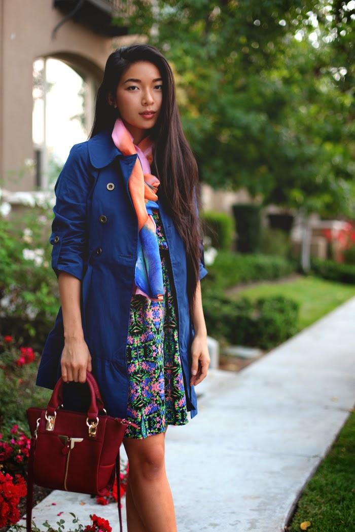 Stephanie Liu of Honey & Silk wearing Everly dress, Tulle coat, Danielle Nicole bag, and Rho scarf