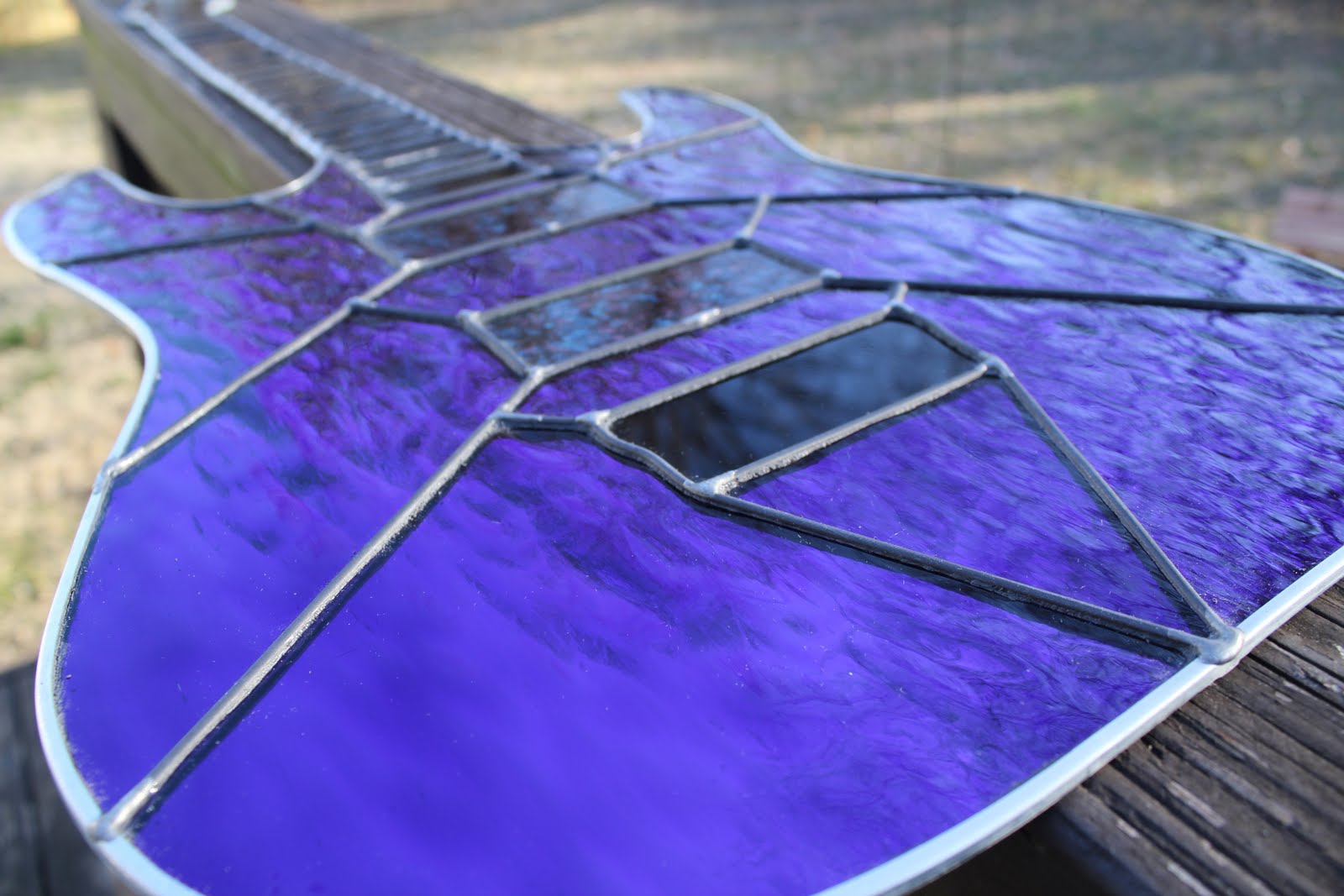 hear-the-raven-s-call-stained-glass-guitar-project