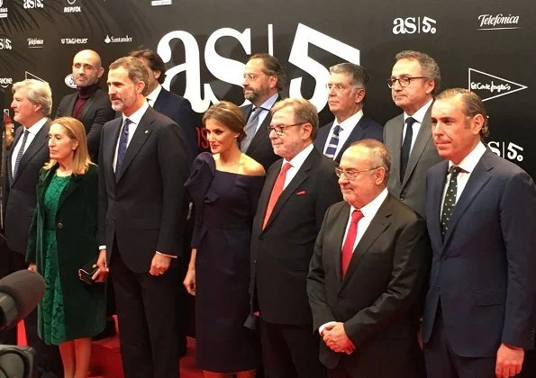 King Felipe. Queen Letizia wore DELPOZO flower embellished long-sleeved dress at As Sports Awards