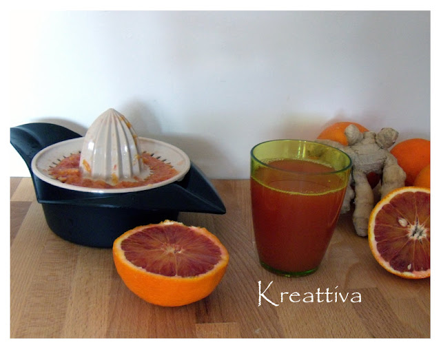 bevanda rinfrescante e dissetante con arancia, lime e zenzero