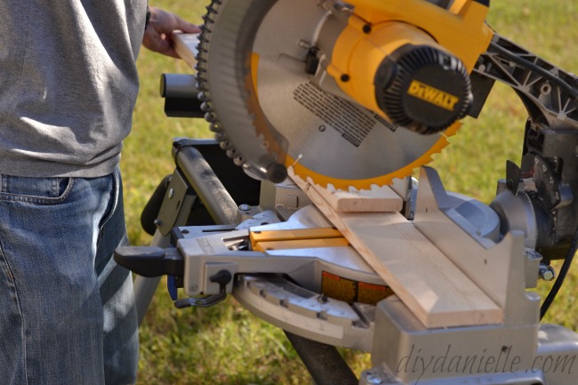 Cutting our wood for the DIY Pet Gate. Cutting Wood.