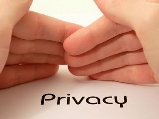 Hands covering words written privacy. Hands covering words written privacy.