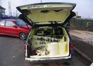 unsecured load of paint in car fail