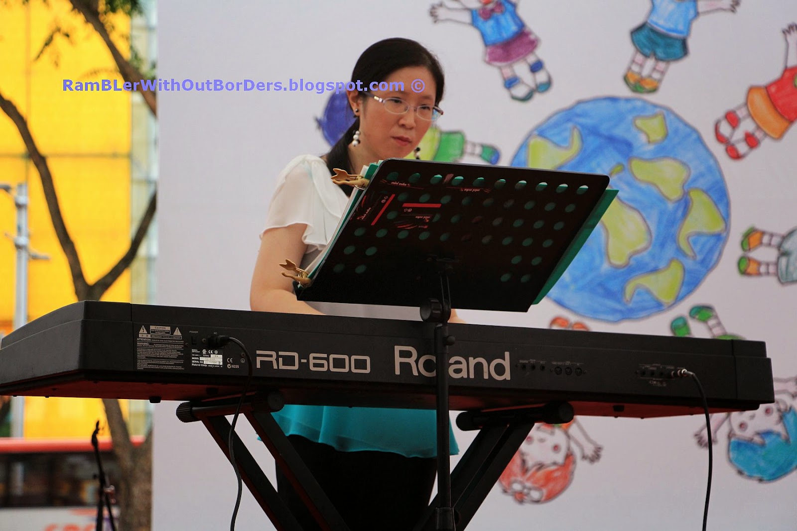 Piano player, Singapore International Red Cross Bazaar 2015