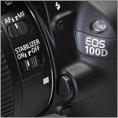 Tampak depan kamera DSLR Canon EOS 100D terlihat beberapa tombol untuk lensa