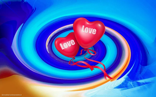Twee rode ballonnen in de vorm van liefdes hartjes met de tekst love