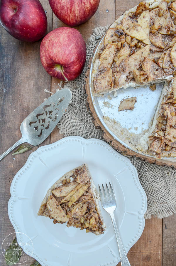 Apples and walnuts are added to the top of this delicious cheesecake.  |  www.andersonandgrant.com