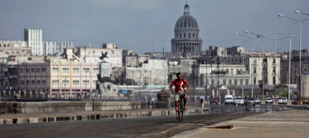 Biking in Havana, Cuba—among those ancient American cars—is another a memorable experience. - 18 Amazing Places You Should Ride Your Bike Before You Die