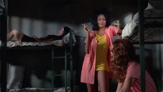 Pam Grier and prisoners in The Big Doll House