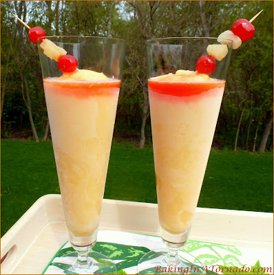 Frozen Mai Tai, a refreshing summer cocktail. The flavors of a Mai Tai blended and frozen. | Recipe developed by www.BakingInATornado.com | #recipe #drink #cocktail