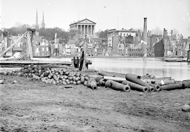 A view of the burned district of Richmond, Virginia, and the Capitol across the Canal Basin, in 1865. The city was assaulted by Union forces for more than nine months during the Siege of Petersburg, after which Confederate Gen. Robert E. Lee's army abandoned the battered city in April, 1865.