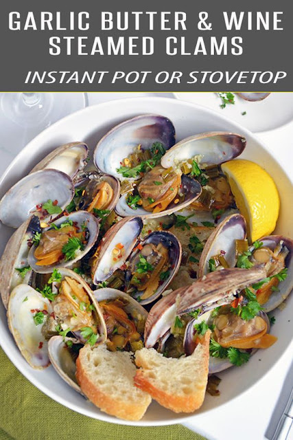 STEAMER CLAMS WITH BUTTER, GARLIC AND WHITE WINE SAUCE STEAMER CLAMS WITH BUTTER, GARLIC AND WHITE WINE SAUCE