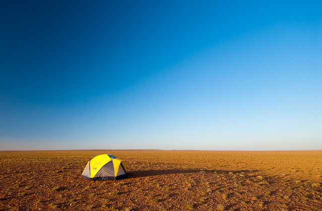 The vast gravel plains of the southern Gobi Desert. You can imagine what the start gazing options are like! Tent. Gobi Desert.