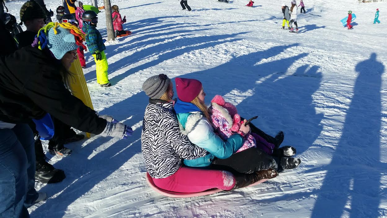 Twelve Makes a Dozen Sledding