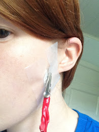 [Image: Photo of my cheek with an electrode attached to it.]