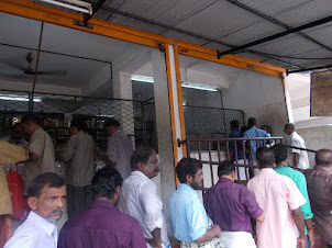 Queue for purchasing "LIQUOR" from registered Govt shop.