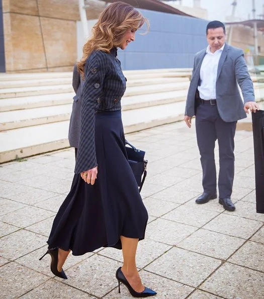 Queen Rania wore A.W.A.K.E. Unbutton Me please top. Queen visited exhibits at the Children’s Museum before attending its board meeting