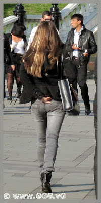 Girl in tight pants on the street 