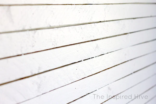 DIY Skinnylap- How to install thin faux shiplap. Get the Fixer Upper modern farmhouse look with a wood lath feature wall. 