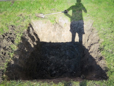 dry well hole ground dug dirt water drainage backyard