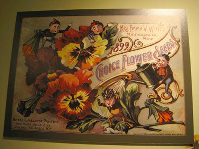 Litho of pansies with pixie figures