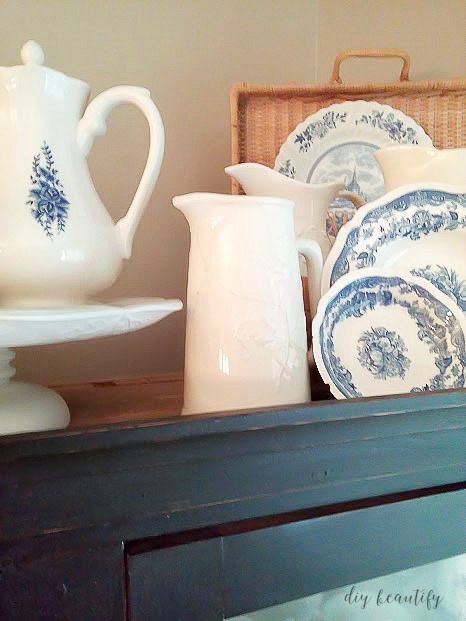 I've an avid dish collector and some of my favorites are my blue and white dishes. Although mismatched, they look beautiful together on this Spring table! Find out more at diy beautify!