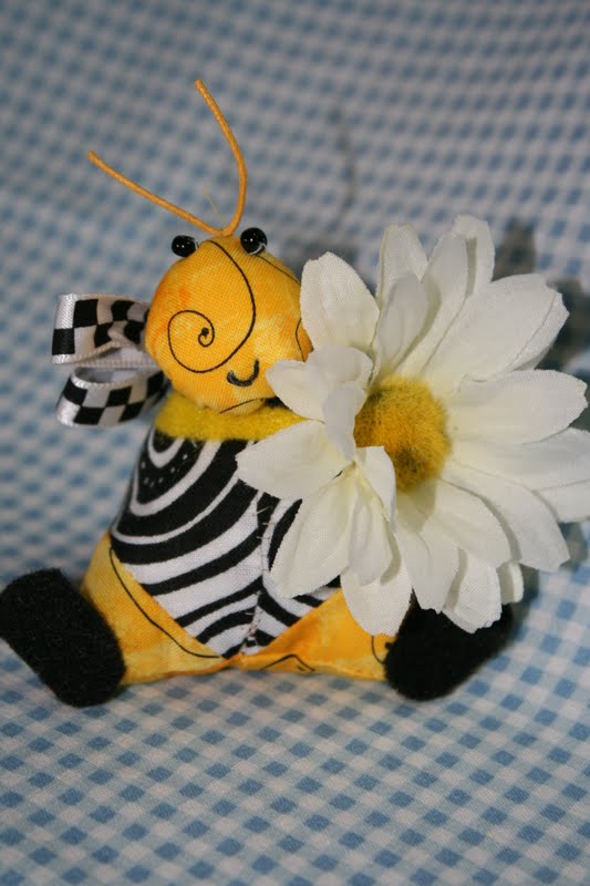 Buzzing and Bumbling Stuffing a Pin Cushion