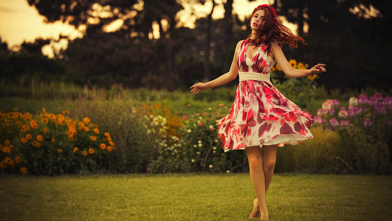 Beautiful Woman in a White and Red Dress