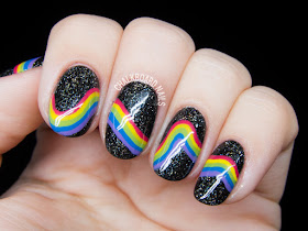 Galactic rainbow nails by @chalkboardnails