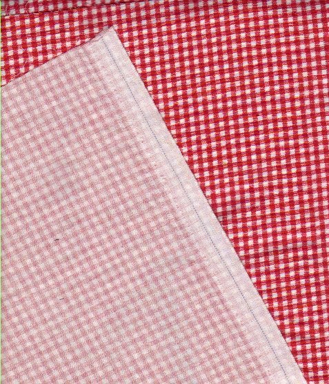 Red printed fabric with checks not suitable for quilts